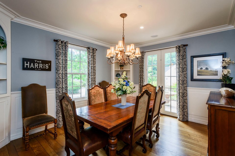 formal dining room with built-in cabinetry