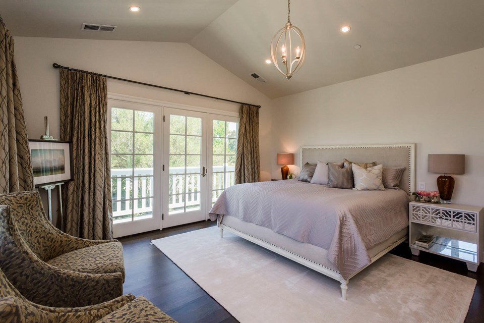 private master suite with breathtaking bay views, private deck and two walk-in closets